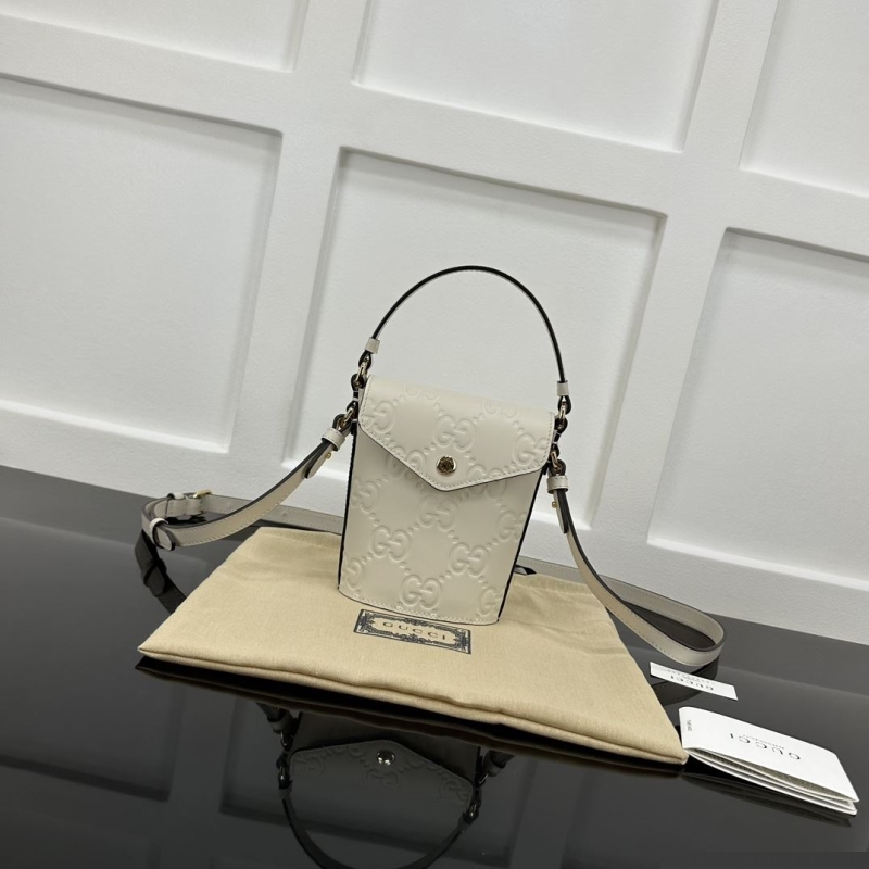 G*u*i top handle bags